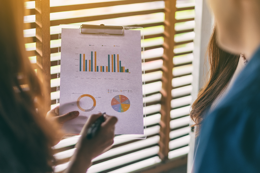 Visa Psychological Evaluations. A person presenting a document to another person.