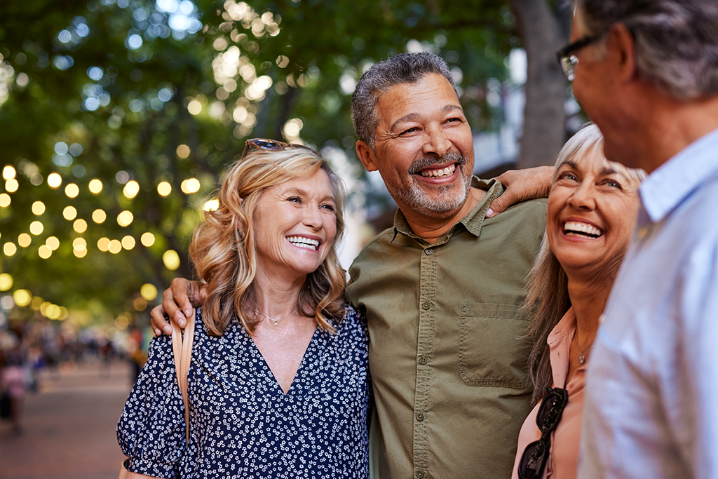 Group of diverse mature individuals laughing